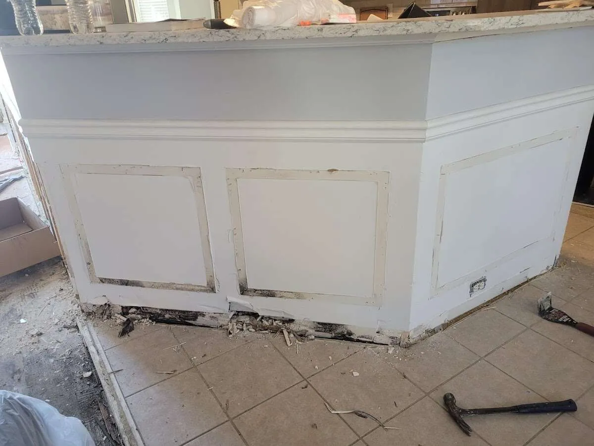 Water damage and mold on kitchen during Storm Damage Restoration in Ormond-by-the-Sea